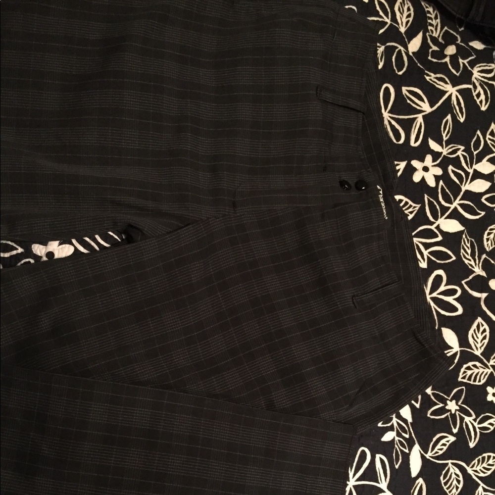 Black plaid slacks.